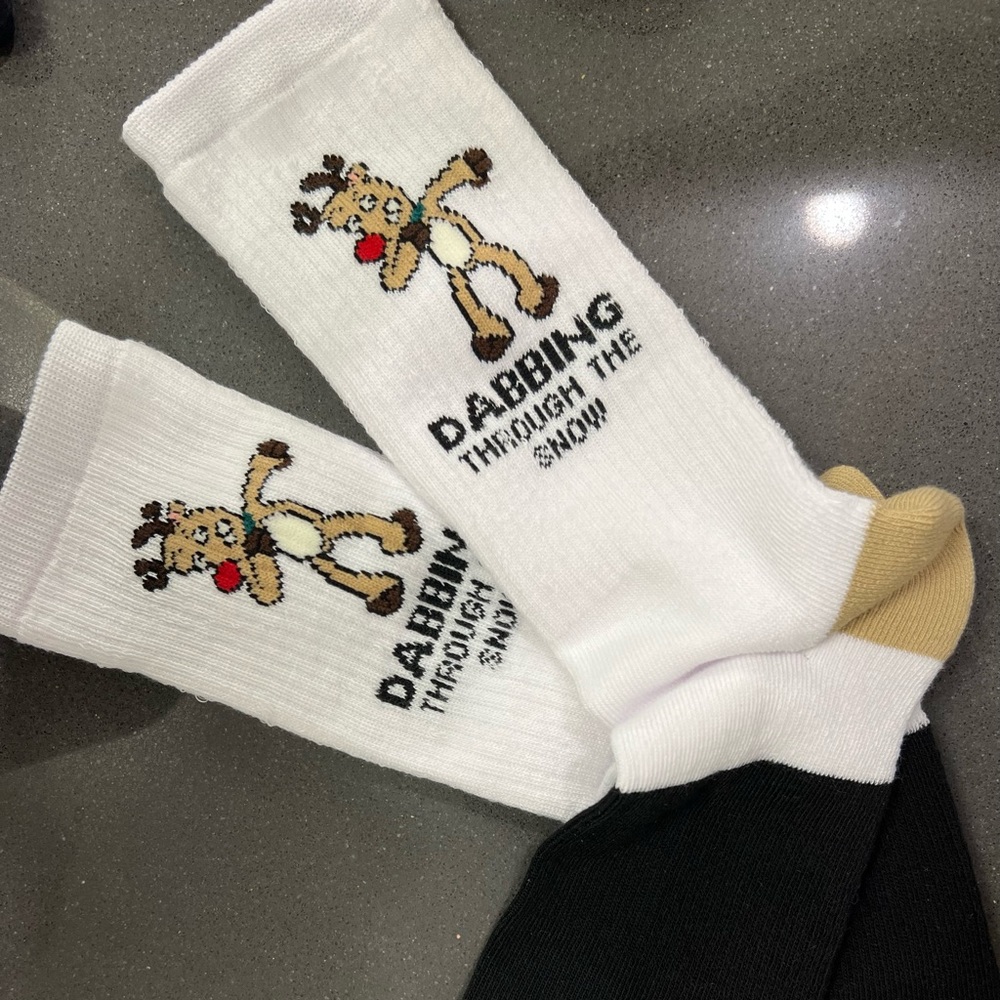 Dabbing through the snow novelty holiday socks fits size 6-12